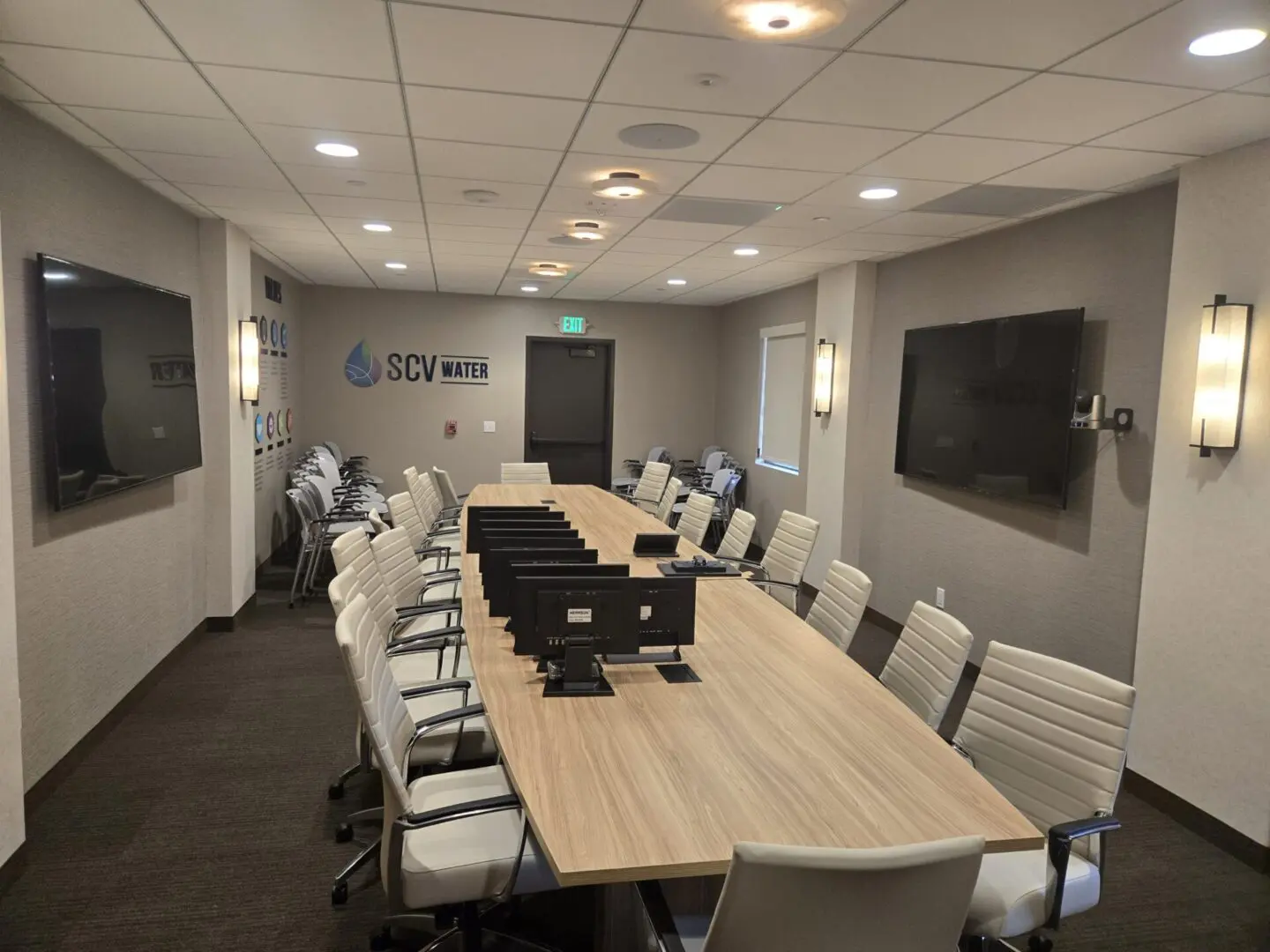 A large conference room with chairs and tables.