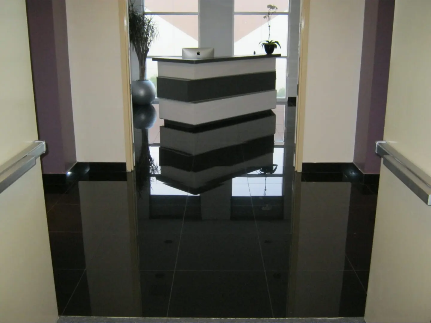 A black and white striped counter in front of a door.